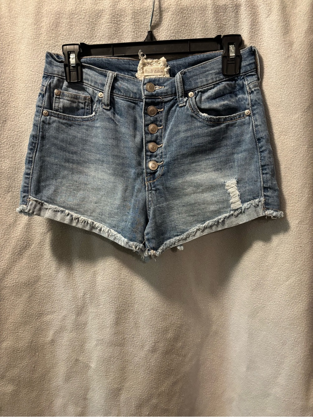 Altar'd State Light Blue Button-Front Distressed Denim Shorts